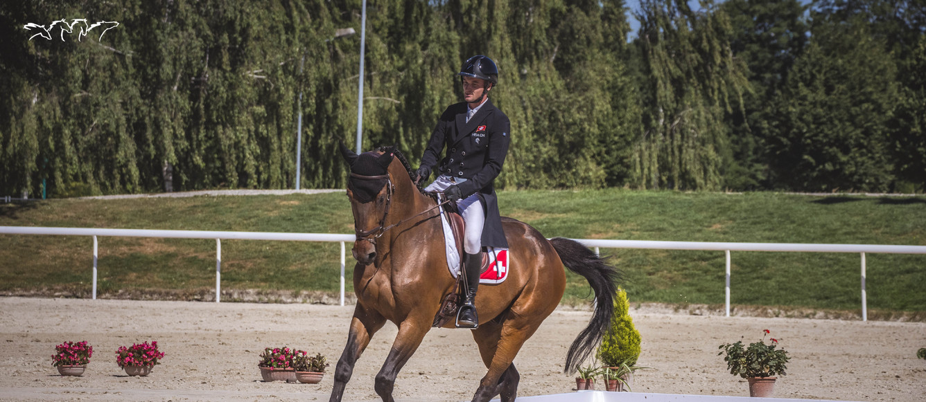 Robin Godel et Grandeur de Lully CH lors du dressage du CCIO 4*-S d'Avenches-IENA. ©IENA