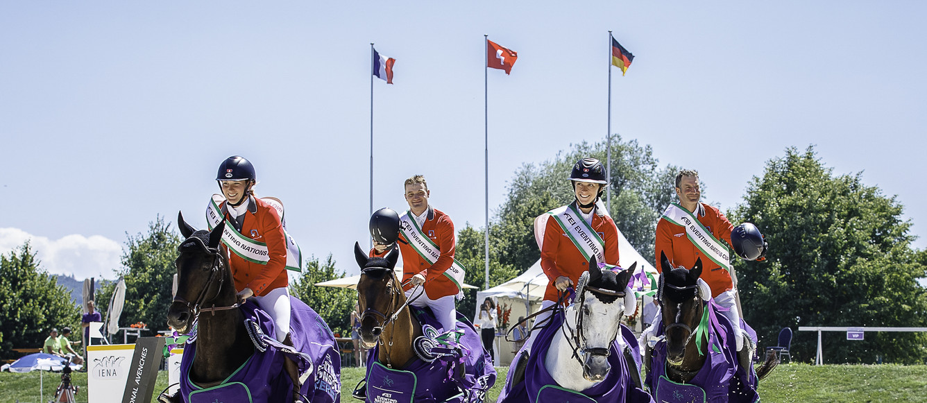 Team Switzerland take the win for the CCIO4*-S FEI Nations Cup Eventing - Switzerland. Nadja Minder and Kabuga, Melody Johner and Toubleu de Rueire, Robin Godel and Grandeur de Lully CH, Patrick Ruegg and Fifty Fifty. 2022 SUI-Avenches Horse Trials. Sunday 10 July 2022. Copyright Photo: Libby Law Photography