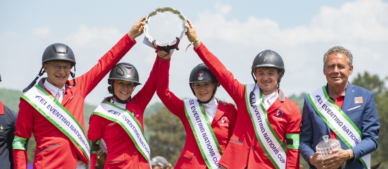 ©FEI/Richard Juilliart FEI World Championships Pratoni - Roma 2022 -Podium - Team Switzerland celebrates victory