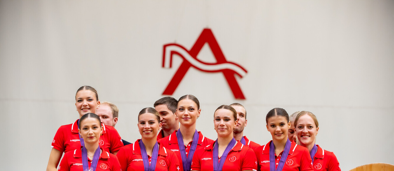 BRONZE: Switzerland Sven Ris-Lukas Heppler - Enya Rawyler - Leonie Linsbichler - Maria Klosin - Kirsten Sennett - Jael Medgyesy - Sarah Linder - OFFICIAL TEAM - FEI EUROPEAN VAULTING CHAMPIONSHIPS FOR SENIORS 2025, 30th of July to 3rd of August 2025, Stadl-Paura, Austria. PC: FEI/Lukasz Kowalski