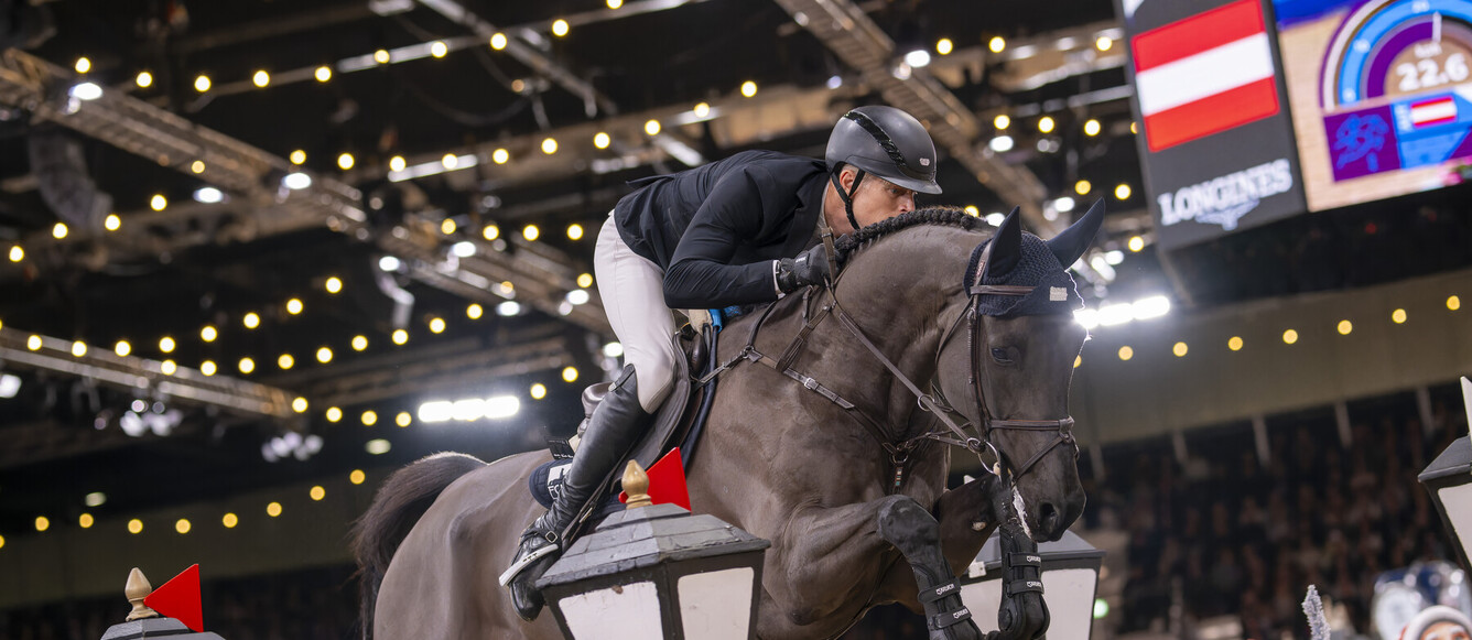 Max K?HNER (AUT) & EIC COOLEY JUMP THE Q compete in THE LONGINES FEI JUMPING WORLD CUP™ presented by Agria - London International Horse Show, Excel London, United Kingdom - 21 December 2025 - photo Jon Stroud Media